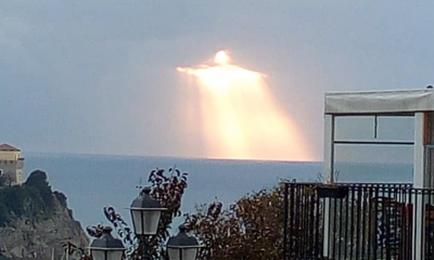 Man captures glowing figure shining through clouds: Many say it looks like Christ the Redeemer