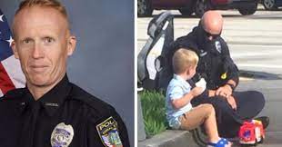 A police officer was sitting next to a young boy and told him few things that moved us to tears