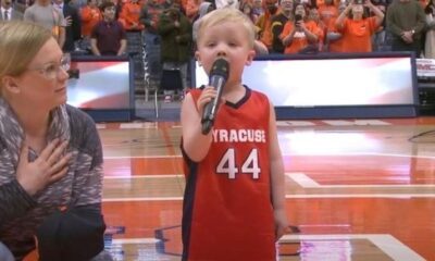In Front Of 6k Sports Fans, A Brave Toddler Takes The Mic And Plays The National Anthem