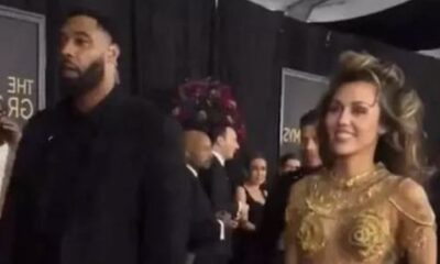 Fans Worried Miley Cyrus Is In “Danger” After Spotting Bodyguard’s Tiny Detail At Grammy Awards