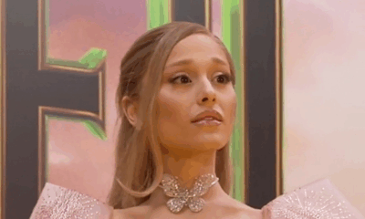 Ariana Grande Charms Fans At BAFTAs While Signing Photos